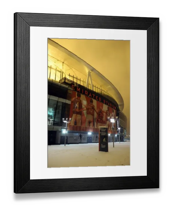 Framed Print : Winter's Reign at Emirates Stadium: Arsenal's Battlefield in the Snowy Premier League Framed Print : Winter's Reign at Emirates Stadium: Arsenal's Battlefield in the Snowy Premier League