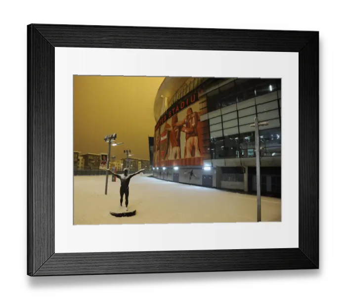 Framed Print : Snowy Emirates Stadium: Arsenal's Winter Showdown