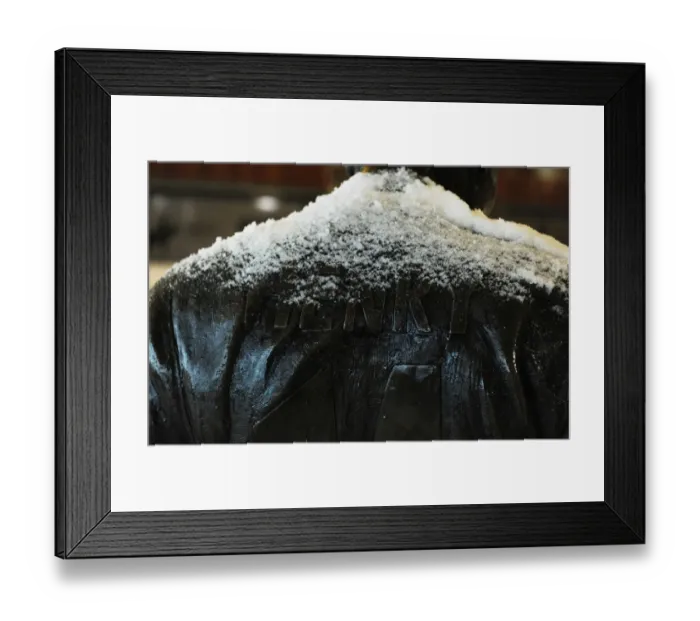 Framed Print : Arsenal's Winter Showdown: A Snowy Battle at Emirates Stadium