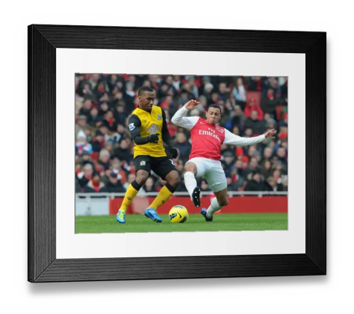 Framed Print : Arsenal vs. Blackburn Rovers: Coquelin Tackles Hoilett in Premier League Clash Framed Print : Arsenal vs. Blackburn Rovers: Coquelin Tackles Hoilett in Premier League Clash