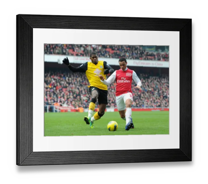Framed Print : Francis Coquelin (Arsenal) Anthony Modeste (Rovers). Arsenal 7: 1 Blackburn Rovers