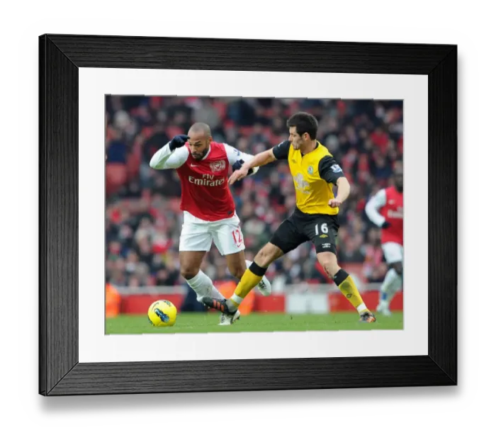 Framed Print : Thierry Henry vs Scott Dann: Intense Battle at Arsenal's Emirates Stadium (Arsenal v Blackburn Rovers 2011-12) Framed Print : Thierry Henry vs Scott Dann: Intense Battle at Arsenal's Emirates Stadium (Arsenal v Blackburn Rovers 2011-12)