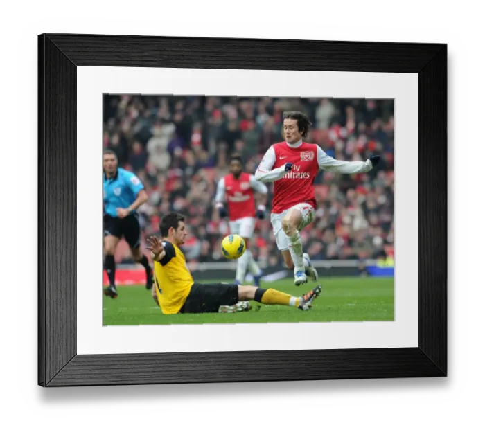 Framed Print : Intense Clash: Rosicky vs. Dann in Arsenal's Premier League Battle