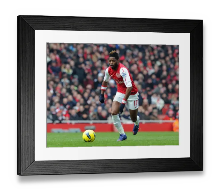 Framed Print : Alex Song's Dominant Performance: Arsenal Crushes Blackburn Rovers 7-1 in Premier League