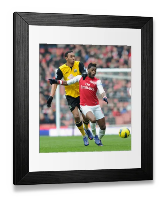 Framed Print : Clash of Midfielders: Alex Song vs. Steven N'Zonzi - Arsenal v Blackburn Rovers, Premier League
