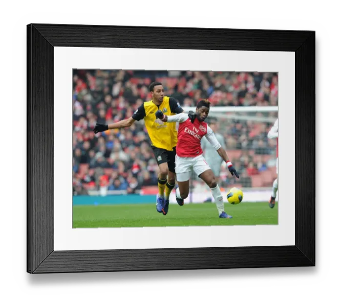 Framed Print : Clash of Midfielders: Song vs. Zonzi - Arsenal v Blackburn Rovers, Premier League Framed Print : Clash of Midfielders: Song vs. Zonzi - Arsenal v Blackburn Rovers, Premier League