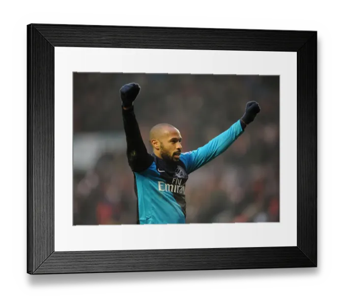 Framed Print : Thierry Henry's Double: Arsenal Celebrate 2-1 Victory Over Sunderland in the Premier League