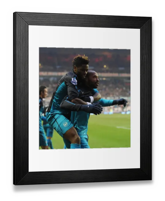 Framed Print : Thierry Henry and Alex Song: Arsenal's Unforgettable Victory Celebration vs. Sunderland, Premier League