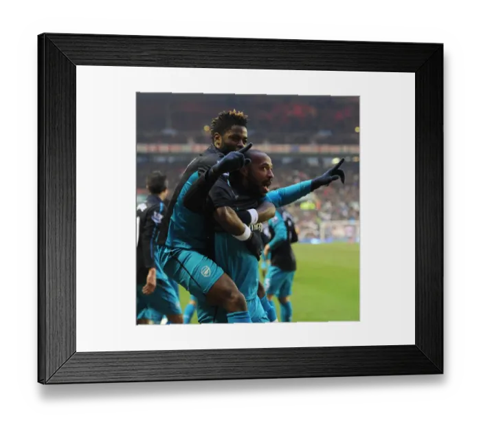 Framed Print : Thierry Henry and Alex Song's Unforgettable Moment: Arsenal's Victory Over Sunderland (2012) - Henry's Strike and Song's Euphoric Celebration