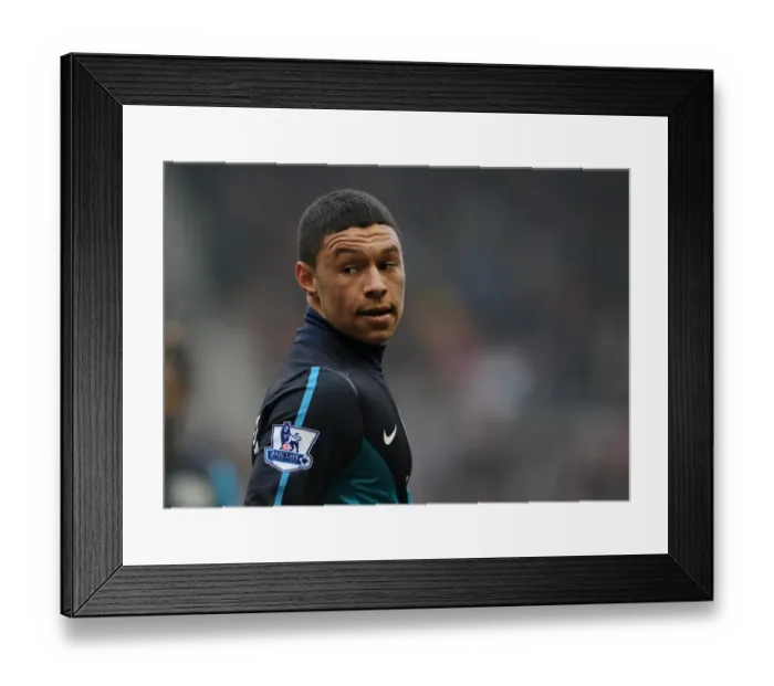 Framed Print : Arsenal's Oxlade-Chamberlain Scores Brace: Arsenal Triumph Over Sunderland 2-1 in Premier League Battle