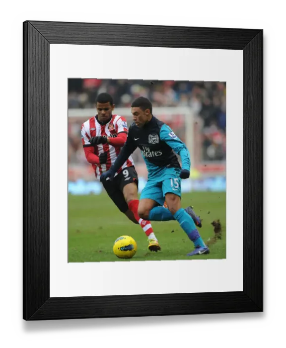Framed Print : Arsenal's Oxlade-Chamberlain Scores Brace as Gunners Edge Past Sunderland 2-1 (Premier League, 2012)