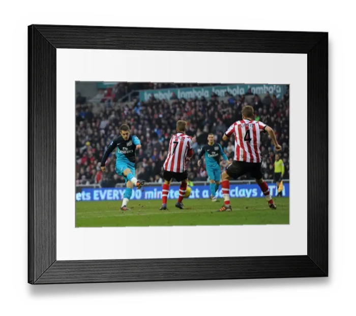 Framed Print : Ramsey Strikes: Arsenal Takes the Lead over Sunderland in Premier League Clash