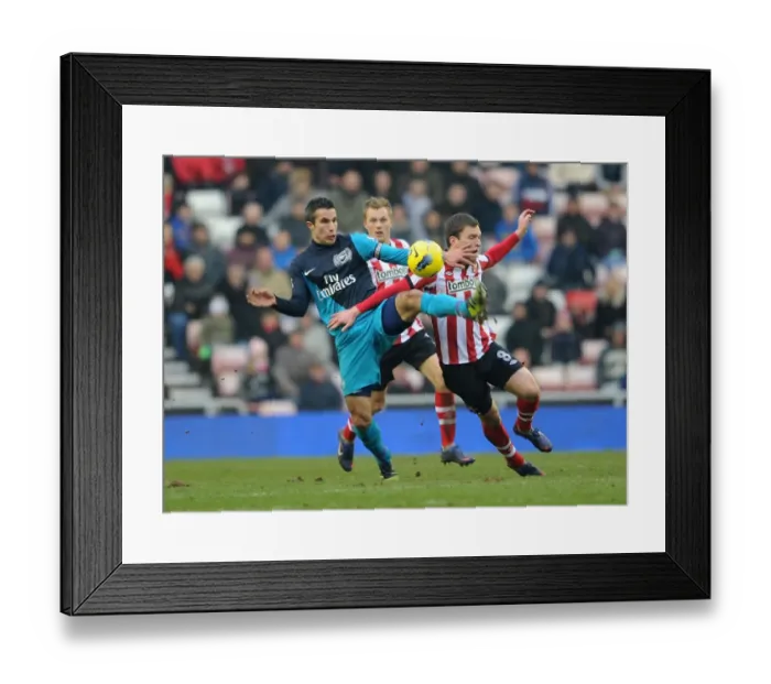 Framed Print : Robin van Persie's Brace Leads Arsenal to 2-1 Victory over Sunderland in Premier League