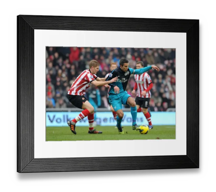 Framed Print : Robin van Persie's Brace: Arsenal Triumphs Over Sunderland 2-1 in Premier League Framed Print : Robin van Persie's Brace: Arsenal Triumphs Over Sunderland 2-1 in Premier League