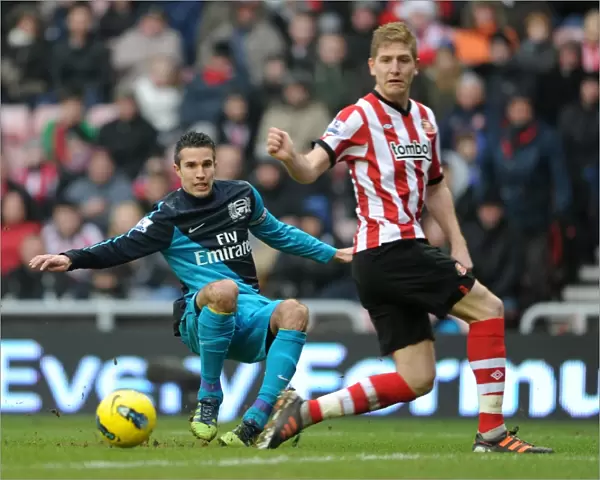 Robin van Persie (Arsenal) Michael Turner (Sunderland). Sunderland 1: 2 Arsenal