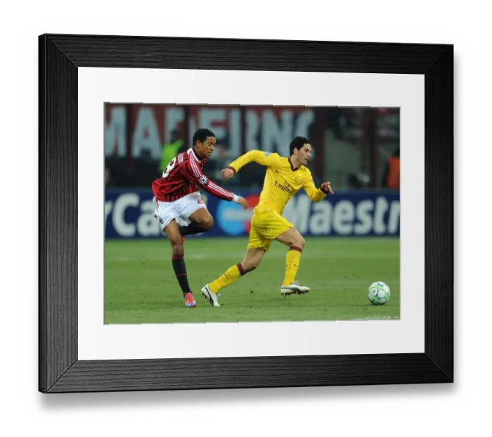 Framed Print : Mikel Arteta Outruns Urby Emanuelson: Intense Moment from AC Milan vs. Arsenal, UEFA Champions League 2012 Framed Print : Mikel Arteta Outruns Urby Emanuelson: Intense Moment from AC Milan vs. Arsenal, UEFA Champions League 2012