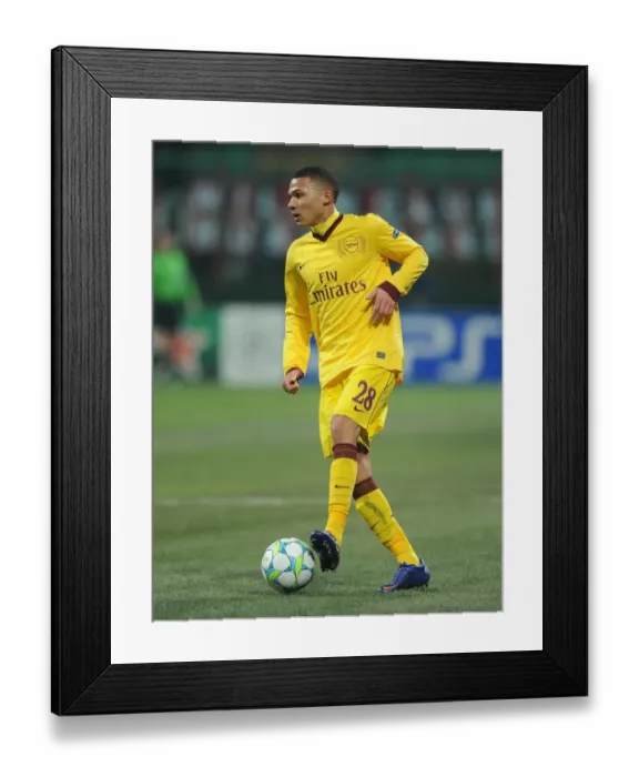 Framed Print : Arsenal's Kieran Gibbs Faces Off Against AC Milan in the 2011-12 UEFA Champions League Framed Print : Arsenal's Kieran Gibbs Faces Off Against AC Milan in the 2011-12 UEFA Champions League