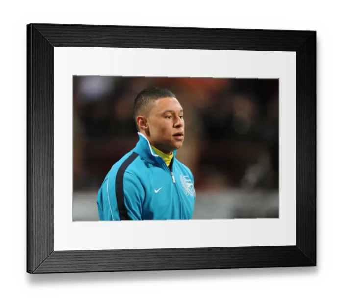 Framed Print : Alex Oxlade-Chamberlain: Arsenal's Ready-for-Battle Midfielder Ahead of AC Milan Clash (UEFA Champions League 2012)