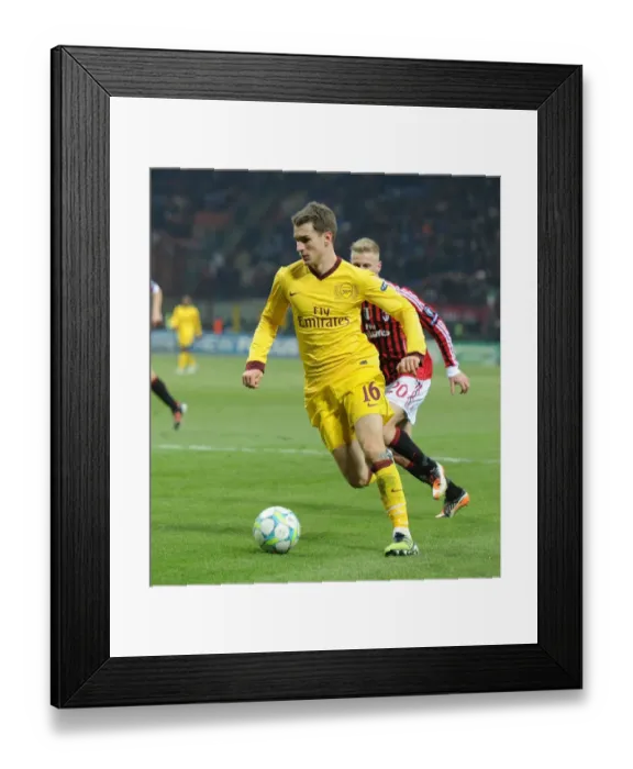 Framed Print : Aaron Ramsey: In Action Against AC Milan, UEFA Champions League 2012