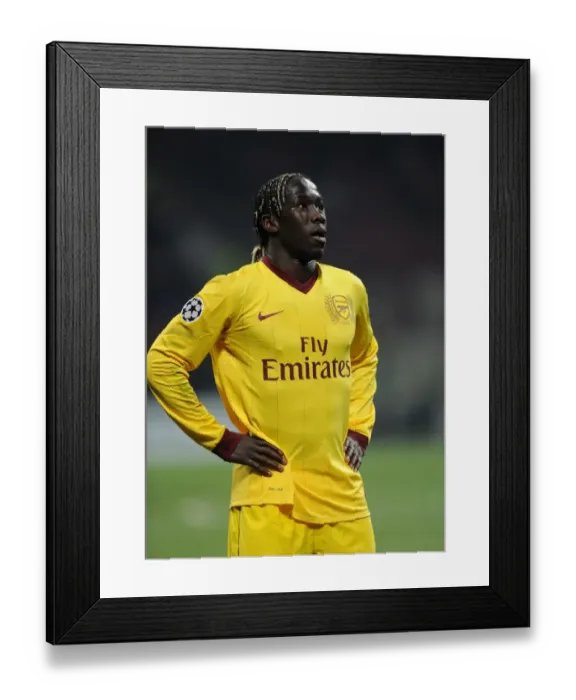 Framed Print : Bacary Sagna (Arsenal). AC Milan 4: 0 Arsenal. UEFA Champions League. First Knock Out Round 1st Leg Framed Print : Bacary Sagna (Arsenal). AC Milan 4: 0 Arsenal. UEFA Champions League. First Knock Out Round 1st Leg