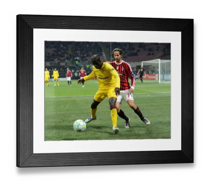 Framed Print : Battling for Possession: Bacary Sagna vs. Luca Antonini - AC Milan vs. Arsenal, UEFA Champions League 2012 Framed Print : Battling for Possession: Bacary Sagna vs. Luca Antonini - AC Milan vs. Arsenal, UEFA Champions League 2012