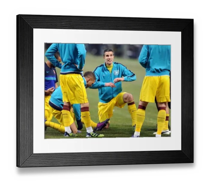 Framed Print : Robin van Persie Rallies Arsenal: United Front Against AC Milan in UEFA Champions League Showdown Framed Print : Robin van Persie Rallies Arsenal: United Front Against AC Milan in UEFA Champions League Showdown
