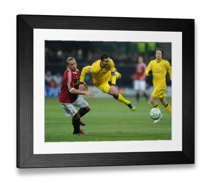 Framed Print : Robin van Persie vs. Philippe Mexes: Clash in the UEFA Champions League Framed Print : Robin van Persie vs. Philippe Mexes: Clash in the UEFA Champions League