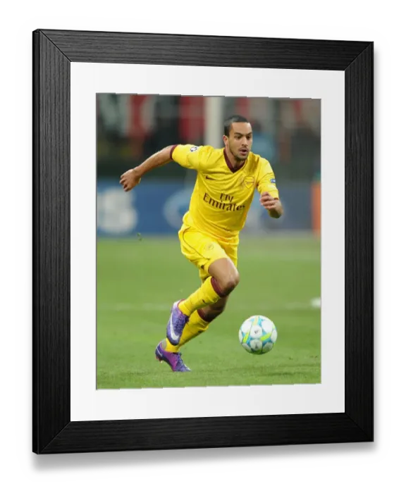 Framed Print : Theo Walcott (Arsenal). AC Milan 4: 0 Arsenal. UEFA Champions League. First Knock Out Round 1st Leg
