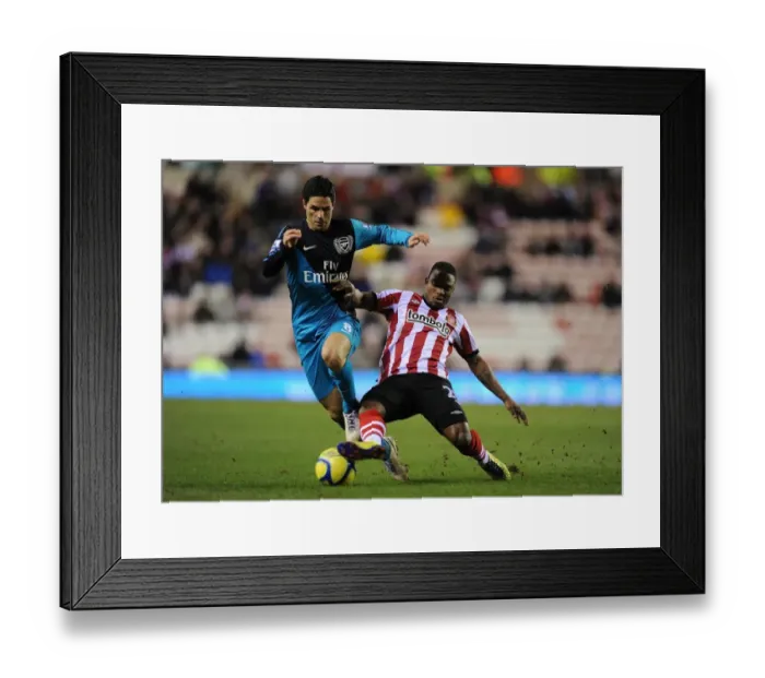 Framed Print : Mikel Arteta vs Stephane Sessegnon: FA Cup Battle at Sunderland, 2012