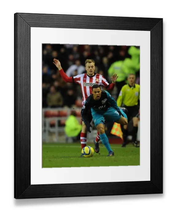 Framed Print : Coquelin vs Larsson: FA Cup Clash Marred by Injury Framed Print : Coquelin vs Larsson: FA Cup Clash Marred by Injury