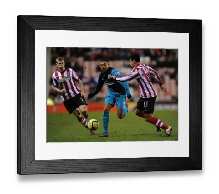 Framed Print : Alex Oxlade-Chamberlain Outsmarts Kieran Richardson: FA Cup Fifth Round Thriller