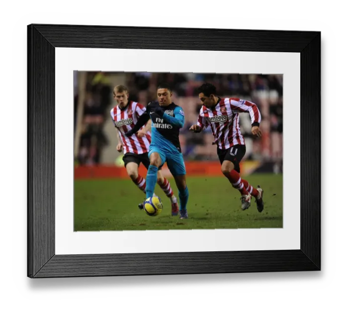 Framed Print : Alex Oxlade-Chamberlain Outsmarts Kieran Richardson: FA Cup Fifth Round Thriller
