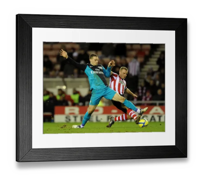 Framed Print : Thomas Vermaelen vs. Lee Catermole: FA Cup Battle at Stadium of Light