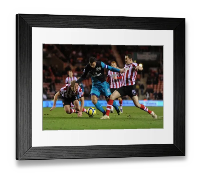 Framed Print : Van Persie vs Turner and O'Shea: Intense Battle in Sunderland's FA Cup Clash with Arsenal Framed Print : Van Persie vs Turner and O'Shea: Intense Battle in Sunderland's FA Cup Clash with Arsenal