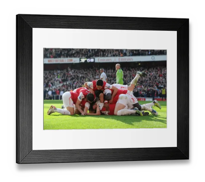 Framed Print : Theo Walcott's Double Stunner: Arsenal's Epic 2012 Premier League Victory Over Tottenham