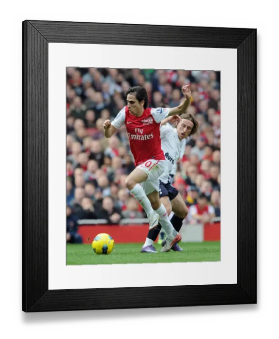Framed Print : Arsenal vs. Tottenham: Yossi Benayoun Outmaneuvers Luka Modric in the 2011-12 Premier League Clash