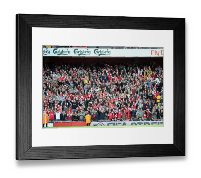 Framed Print : Arsenal's Euphoric Goal Celebration: Defeating Tottenham in the Premier League (2011-12)