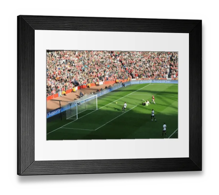 Framed Print : Theo Walcott's Historic Rivalry-Defying Goal for Arsenal Against Tottenham (2012) Framed Print : Theo Walcott's Historic Rivalry-Defying Goal for Arsenal Against Tottenham (2012)