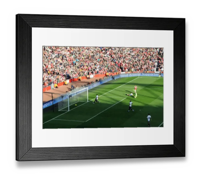 Framed Print : Theo Walcott's Historic Rivalry-Defying Goal for Arsenal Against Tottenham (2012)