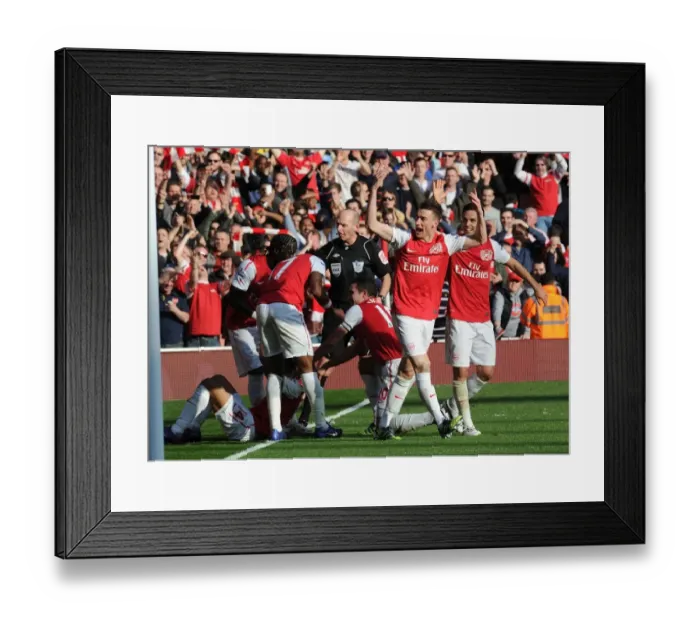 Framed Print : Arsenal's Five-Goal Blitz: Koscielny and Arteta Celebrate Walcott's Goal vs. Tottenham (2011-12) Framed Print : Arsenal's Five-Goal Blitz: Koscielny and Arteta Celebrate Walcott's Goal vs. Tottenham (2011-12)