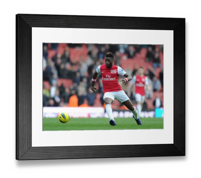 Framed Print : LONDON, ENGLAND - FEBRUARY 26: Alex Song of Arsenal during the Barclays Premier League match between Arsenal and Tottenham Hotspur at Emirates Stadium on February 26, 2012 in London, England. (Photo by Stuart MacFarlane  /  Arsenal FC via