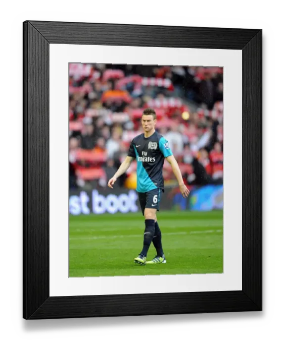 Framed Print : Laurent Koscielny Focused During Liverpool vs Arsenal Premier League Clash (2011-12) Framed Print : Laurent Koscielny Focused During Liverpool vs Arsenal Premier League Clash (2011-12)