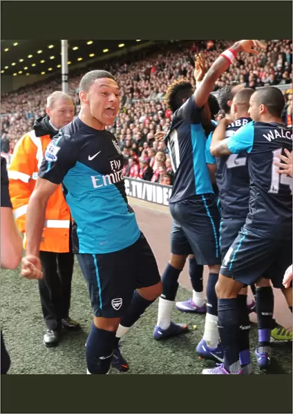 Alex Oxlade-Chamberlain and Robin van Persie Celebrate Arsenal's Winning Goal vs. Liverpool (2012)
