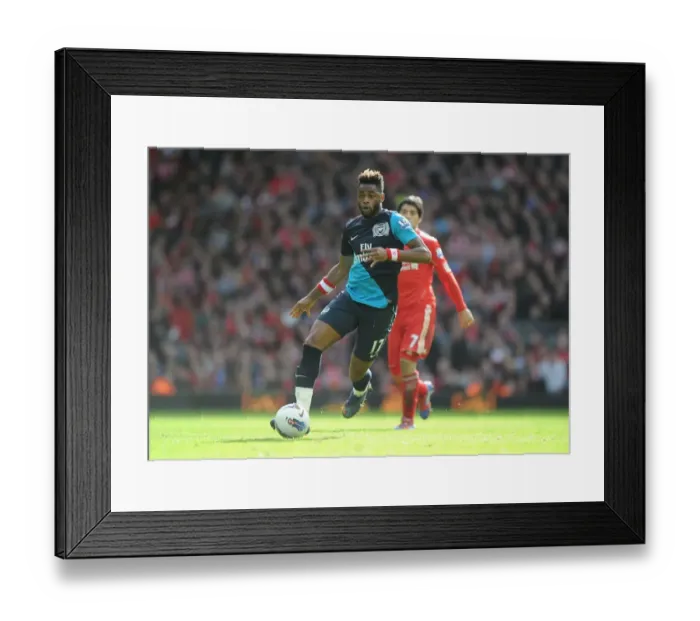 Framed Print : Arsenal's Alex Song at Liverpool's Anfield in 2011-12 Premier League Clash