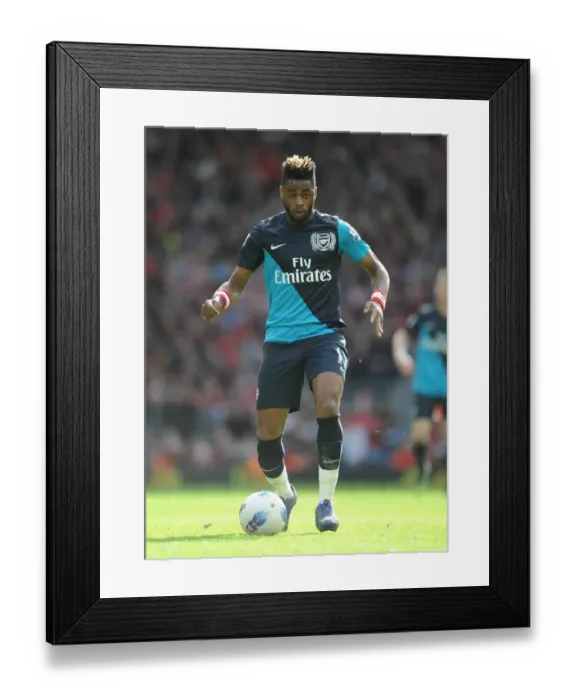 Framed Print : Alex Song Faces Liverpool: Premier League Showdown (2011-2012) Framed Print : Alex Song Faces Liverpool: Premier League Showdown (2011-2012)