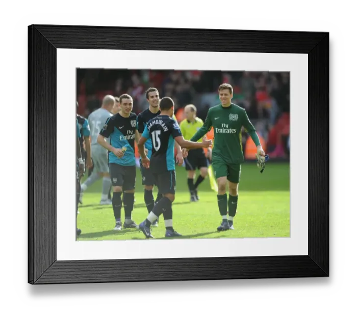 Framed Print : Arsenal's Triumph over Liverpool: The Exciting Moment of Victory in the 2012 Premier League