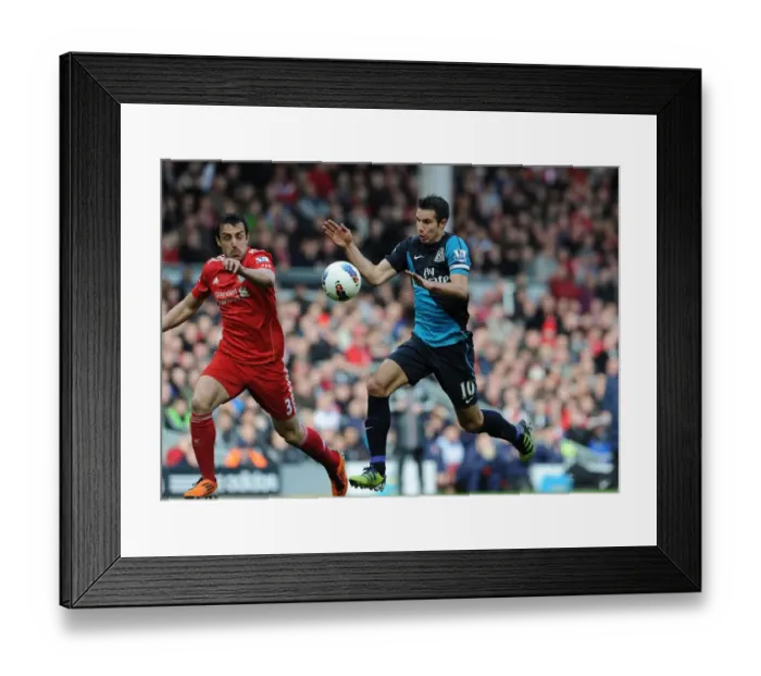Framed Print : Van Persie vs Enrique: Intense Battle at Anfield (Liverpool v Arsenal, Premier League 2011-12)