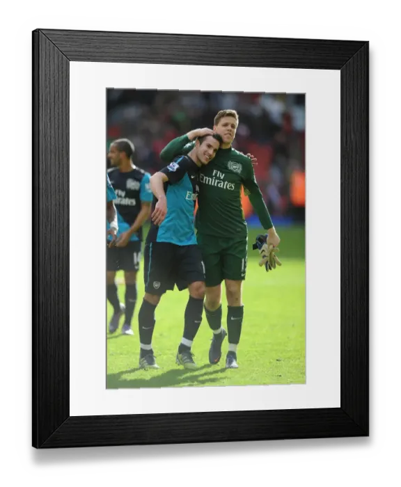 Framed Print : Van Persie and Szczesny: Arsenal's Unstoppable Duo Celebrate Victory at Anfield, 2012 Framed Print : Van Persie and Szczesny: Arsenal's Unstoppable Duo Celebrate Victory at Anfield, 2012