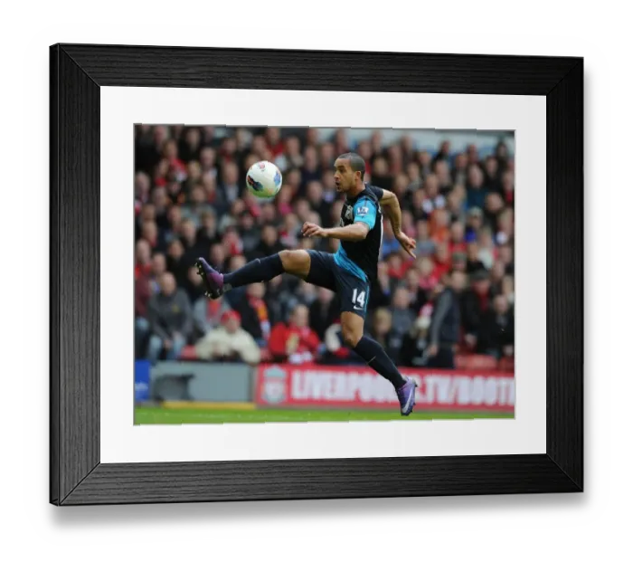 Framed Print : Theo Walcott Faces Liverpool: Premier League Showdown (2011-12)