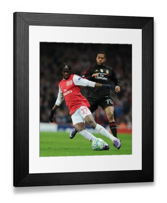 Framed Print : Gervinho Outmaneuvers Robinho: Arsenal FC vs AC Milan, UEFA Champions League Round of 16 Framed Print : Gervinho Outmaneuvers Robinho: Arsenal FC vs AC Milan, UEFA Champions League Round of 16